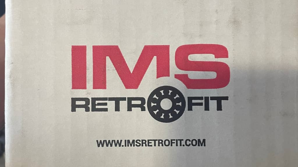 IMS Intermediate Shaft bearing kit with bearing, crankshaft seal, and installation tools for Porsche M96 engine.